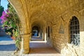 Pathway between a stonebuilding and a church This is an archealogical site in and around the hill of Philerimos in Ialysos Rhodes Royalty Free Stock Photo