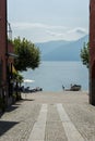Pathway to lago maggiore with water and mountain view in ascona switzerland Royalty Free Stock Photo