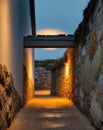Pathway to Light Through a Narrow Passage. Royalty Free Stock Photo