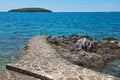 Pathway on the rocky beach in Istria Royalty Free Stock Photo