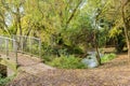 Pathway a walk bridge in a local park Autumn time Royalty Free Stock Photo