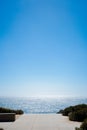 Pathway walkway to the ocean on a sunny day Royalty Free Stock Photo