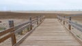 Pathway wooden to access beach in Gruissan mediterranean sea France Royalty Free Stock Photo