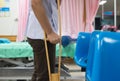 Patian on crutches in hospital Royalty Free Stock Photo