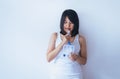 Patient woman using incentive spirometer or three balls for stimulate lung on white blackground Royalty Free Stock Photo