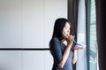 Patient asian woman using incentivespirometer or three balls for stimulate lung Royalty Free Stock Photo