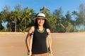 Patient asian woman using crutches support broken legs for walking at the beach,Physical therapy concept