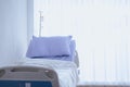 Patient bed in hospital or clinic. Blanket and pillow. Interior of an empty hospital room Royalty Free Stock Photo