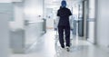 Patient, bed and nurse walking in hospital, hallway or corridor to surgery, operation room or ER healthcare service Royalty Free Stock Photo