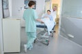 Patient being wheeled on hospital stretcher