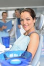 Patient on chair dental surgery dentist assistant Royalty Free Stock Photo