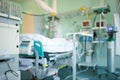 Patient connected to the life-supporting equipment in the ICU, unfocused backgound Royalty Free Stock Photo