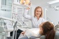 Patient consulting with dentist in clinic. Royalty Free Stock Photo