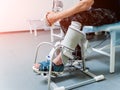 Patient on CPM machines, continuous passive range of motion. Royalty Free Stock Photo