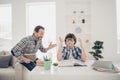 Patient daddy doing home tasks with his offspring concept. Intelligent schoolkid trying to remember historical date or Royalty Free Stock Photo