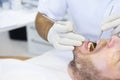 Patient in dental office on regular checkup Royalty Free Stock Photo