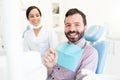 Patient With Dentist At Clinic Royalty Free Stock Photo