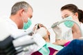 Patient with Dentist - dental treatment Royalty Free Stock Photo