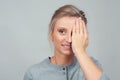 Patient doing an eye checkup. Woman closing her eye Royalty Free Stock Photo