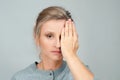 Patient doing an eye checkup. Woman closing her eye Royalty Free Stock Photo