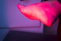 Patient foot in red physiotherapy heat treatment Royalty Free Stock Photo