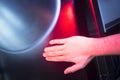 Patient hand in red physiotherapy heat treatment Royalty Free Stock Photo