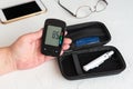Measuring glucose level blood test with glucometer Royalty Free Stock Photo