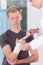 Patient having bandaged hand