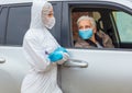 Patient having a conversation with a doctor in drive-thru