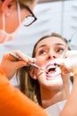Patient having deep dental tooth cleaning
