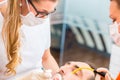 Patient having dental deep tooth cleaning