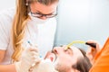 Patient having dental deep tooth cleaning