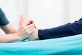 Patient having foot massage at physio