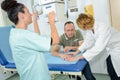 Patient having hand scanned after accident Royalty Free Stock Photo