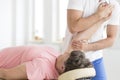 Patient having her hand stretched