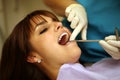 Patient having teeth examined