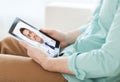 Patient having video chat with doctor on tablet pc Royalty Free Stock Photo