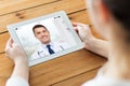 Patient having video chat with doctor on tablet pc Royalty Free Stock Photo