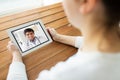 Patient having video chat with doctor on tablet pc Royalty Free Stock Photo