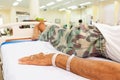 Patient lie on bed in emergency room