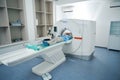 Patient lies in chamber of the tomograph in diagnostic center Royalty Free Stock Photo