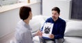 Patient Looking At Rorschach Inkblot Held