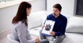 Patient Looking At Rorschach Inkblot Held