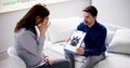 Patient Looking At Rorschach Inkblot Held