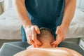 Patient with neck pain getting acupressure massage from doctor therapist masseur, close up. Chinese medicine treatment Royalty Free Stock Photo