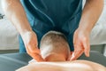 Patient with neck pain getting acupressure massage from doctor therapist masseur, close up. Chinese medicine treatment Royalty Free Stock Photo