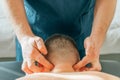 Patient with neck pain getting acupressure massage from doctor therapist masseur, close up. Chinese medicine treatment Royalty Free Stock Photo