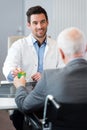 patient paying doctor by card Royalty Free Stock Photo