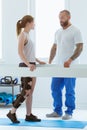 Patient and physiotherapist at the first appointment Royalty Free Stock Photo