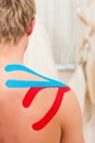 Patient at the physiotherapy with tape Royalty Free Stock Photo